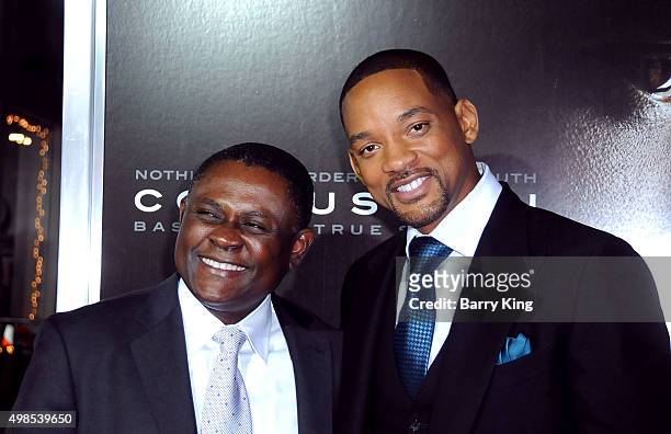 Dr. Bennet Omalu and Actor Will Smith attend screening of Columbia Pictures' 'Concussion' at the Regency Village Theatre on November 23, 2015 in...