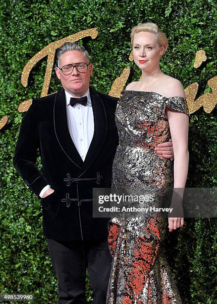 Giles Deacon and Gwendoline Christie attend the British Fashion Awards 2015 at London Coliseum on November 23, 2015 in London, England.