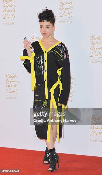 Twigs poses in the Winners Room at the British Fashion Awards 2015 at London Coliseum on November 23, 2015 in London, England.