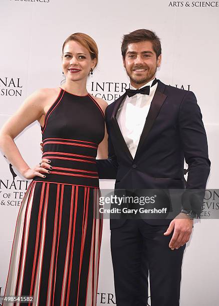 Presenters Leandra Leal and Lourenco Ortigao pose for pictures during the 43rd International Emmy Awards press room reception on November 23, 2015 in...