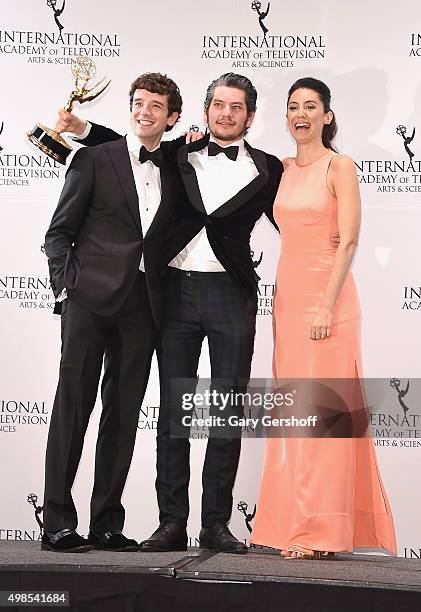 Award winner for Best Performance By An Actor Maarten Heijmans and presenters Michael Urie and Mozhan Marno pose for pictures during the 43rd...