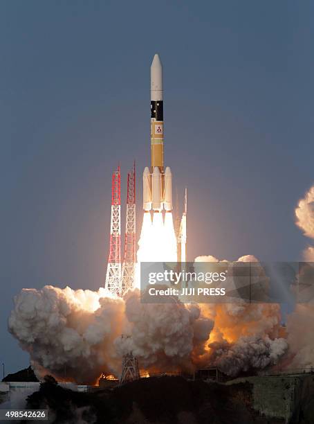 Japan's H-2A rocket lifts off from the launch pad at the Tanegashima Space Center on Japan's southern island of Tanegashgima in Kagoshima prefecture...