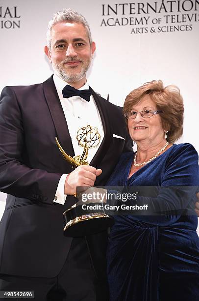 Award winners for Non-Scripted Entertainment for '50 Ways To Kill Your Mammy', executive producer Baz Ashmawy and cast member Nancy Ashmawy pose for...