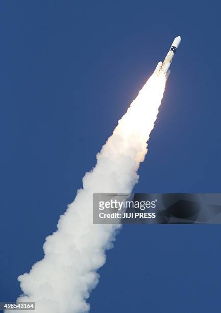Japan's H-2A rocket rises into the sky from the Tanegashima Space Center on Japan's southern island of Tanegashgima in Kagoshima prefecture on...