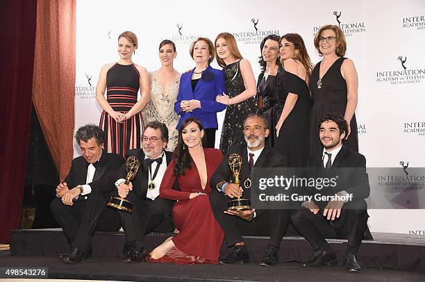 Award winners for Best Comedy, 'Doce De Mae' from Brazil pose for pictures during the 43rd International Emmy Awards press room reception on November...