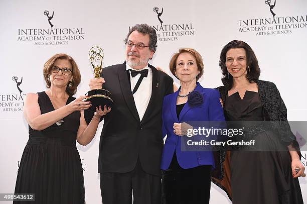 Award winners for Best Comedy, 'Doce De Mae' writer Ana Luiza Azevedo, producer Jorge Furtado and actress Fernanda Montenegro pose for pictures...