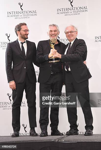 Award winners for TV Movie/Mini-Series, 'Soldat Blanc' from France, Director Erick Zonca and producer Georges Campana pose for pictures during the...