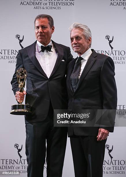 Special Directorate Award Recipient, Chairman & CEO, HBO, Richard Plepler and presenter, actor Michael Douglas pose for pictures during the 43rd...