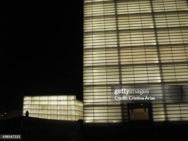 The Kursaal at night, the conference center and auditorium designed by the architect Rafael Moneo in 1999, San Sebastian , Guipuzcoa, Basque Country,...