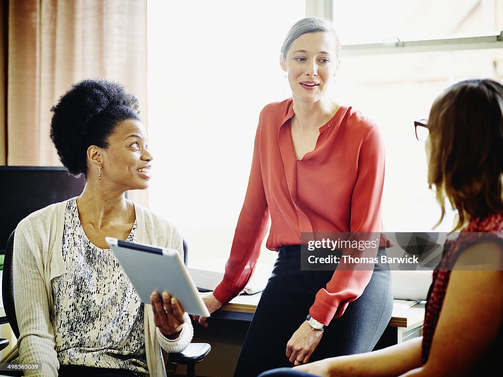 Businesswomen having informal meeting in office