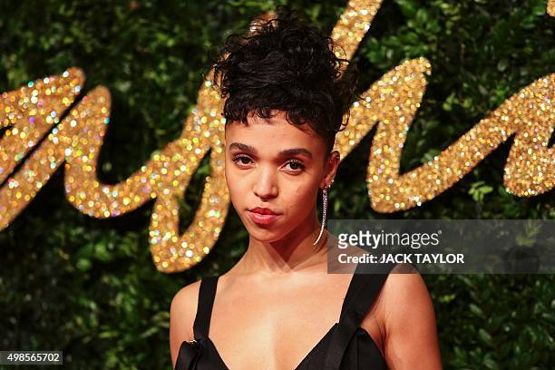 British singer FKA twigs poses as she arrives to attend the British Fashion Awards 2015 in London on November 23, 2015. AFP PHOTO / JACK TAYLOR / AFP...