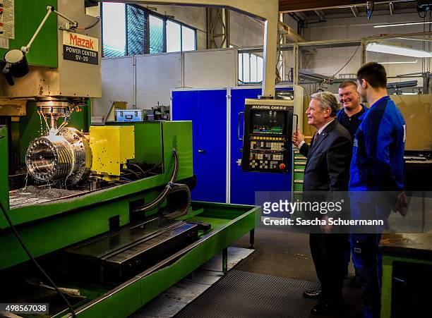 German President Joachim Gauck meets trainees at a job training facility at W. Eubel GmbH machine manufacturer on November 24, 2015 in Cologne,...