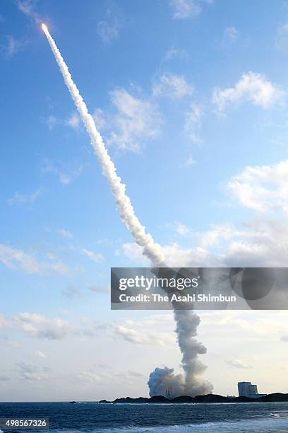 The H-2A Launch Vehicle No.29 of the Japan Aerospace Exploration Agency and Mitsubishi Heavy Industries leaves a contrail after the launch at the...