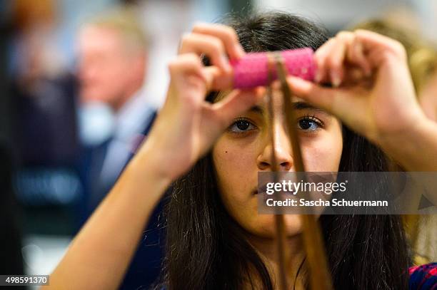 Students with an immigrant background working as a hairdresser with a dummy at the Vocational training center of the Chamber of Crafts on November...