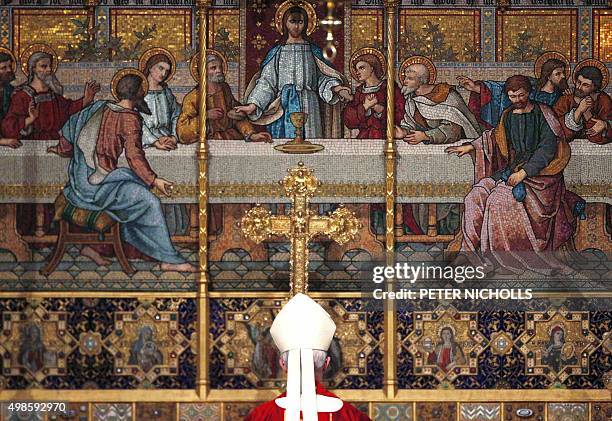 The Archbishop of Canterbury, Justin Welby faces the altar during a service at Westminster Abbey in central London on November 24 on the occaision of...