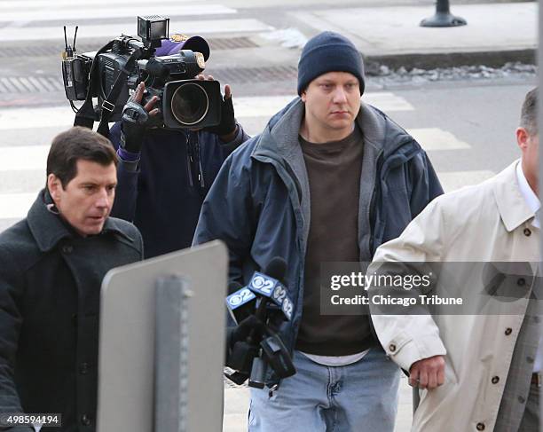 Chicago police Officer Jason Van Dyke arrives at the Leighton Criminal Courthouse in Chicago on Tuesday, Nov. 24 to possibly face charges for the...