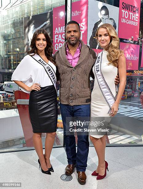 Miss Universe Paulina Vega, Extra's host A. J. Calloway and Miss USA 2015 Olivia Jordan visit "Extra" at H&M Times Square on November 24, 2015 in New...