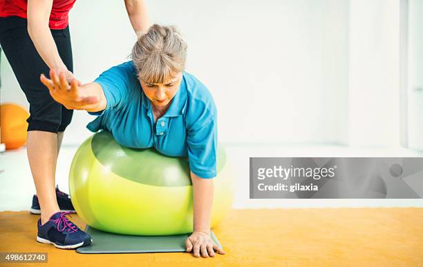 weight loss exercise in a gym. - fat loss training stock pictures, royalty-free photos & images