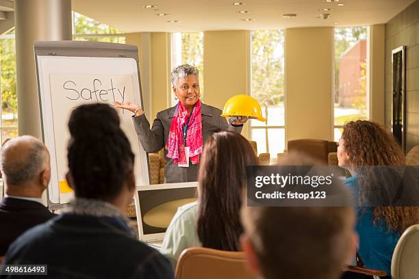 safety in the workplace. presentation with workers. - department of public safety stock pictures, royalty-free photos & images