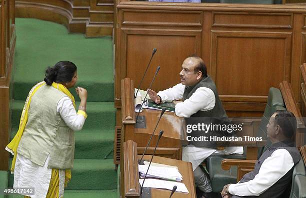 Rakhi Birla arguing with opposition leader and BJP MLA Vijender Gupta during the winter session of Delhi Vidhan Sabha, on November 24, 2015 in New...