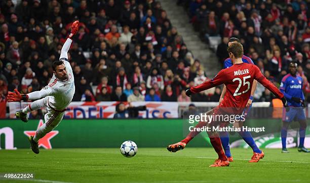 Thomas Mueller of Bayern Muenchen scores his teams third goal during the UEFA Champions League group F match between FC Bayern Munchen and Olympiacos...