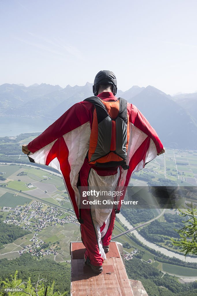 Wingsuit BASE jumper on the exit ramp is ready