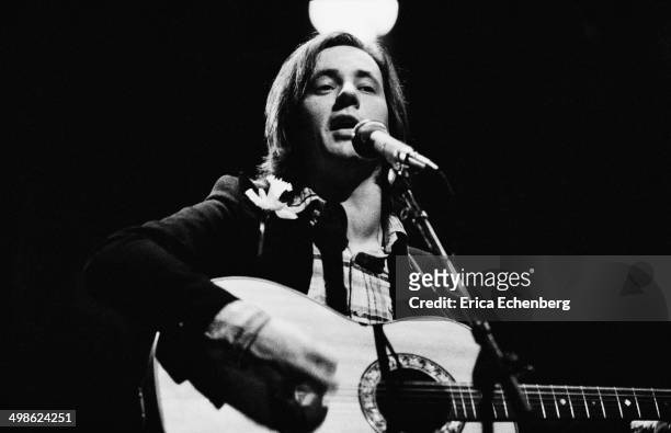 Andy Fairweather Low performs on stage at the New Victoria Theatre, London, 1976.
