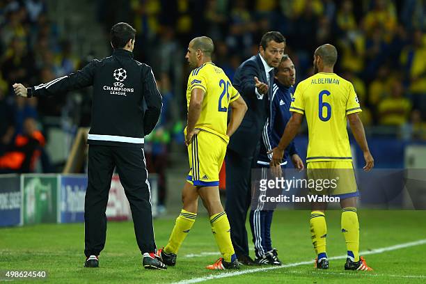 Tal Ben Haim of Maccabi Tel-Aviv leaves the field after being sent off by referee Alberto Undiano Mallenco for a late challenge on Diego Costa of...