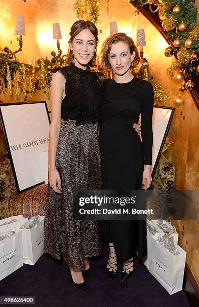 Alexa Chung and Katherine Power attend the WhoWhatWear UK Launch at Loulou's on November 24, 2015 in London, England.