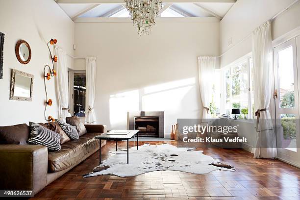 bohemian style living room - home interior no people stock pictures, royalty-free photos & images