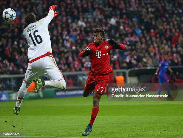 Kingsley Coman of Bayern Muenchen scores his teams fourth goal past Roberto of Olympiacos during the UEFA Champions League group F match between FC...