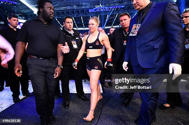 Ronda Rousey exits the Octagon after being defeated by Holly Holm in their UFC women's bantamweight championship bout during the UFC 193 event at...