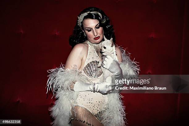 Portrait of Lady Alex, producer and host of the Wam Bam Club, and her pet dog Sookie in the backstage area of Cafe de Paris in central London. Every...