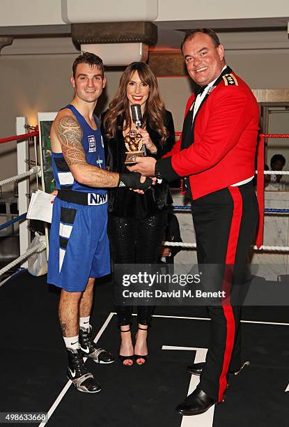 Best Boxer of the Evening Iain McCondichie, Alex Jones and Col. Mike Tanner attend the Royal Marines Boxing Bout at Cafe Royal in celebration of...