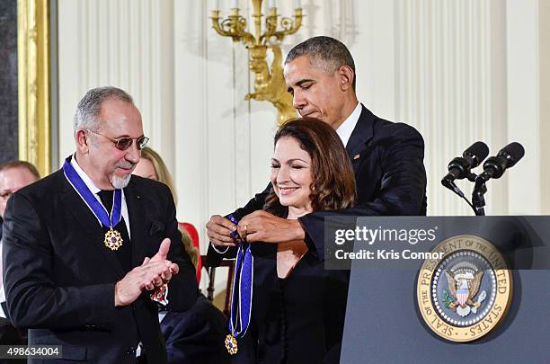 President Barack Obama presents Emilio Estefan and Gloria Estefan with Presidential Medals of Freedom during the 2015 Presidential Medal Of Freedom...