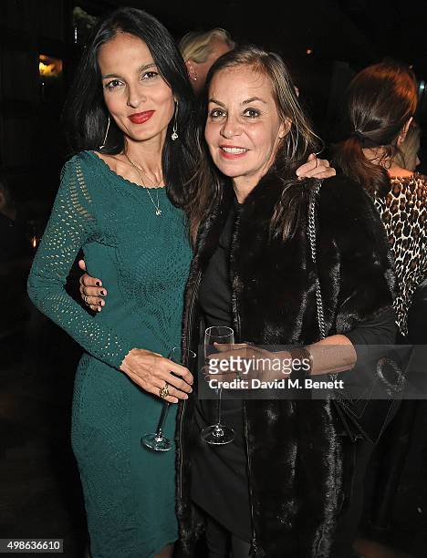 Yasmin Mills and Carole Siller McCalpine attend Vivienne Westwood Christmas tree unveiling at aqua shard on November 24, 2015 in London, England.