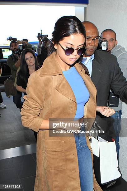 Selena Gomez is seen at LAX on November 24, 2015 in Los Angeles, California.