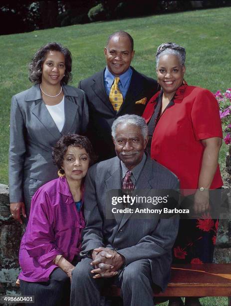 Portrait of married American actors and Civil Rights activists Ruby Dee and Ossie Davis as they pose outdoors with their children, late 1990s or...