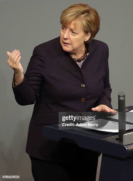 German Chancellor Angela Merkel speaks during a meeting of the Bundestag, the German federal parliament, as its members discuss the country's 2016...