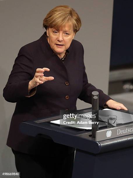 German Chancellor Angela Merkel speaks during a meeting of the Bundestag, the German federal parliament, as its members discuss the country's 2016...