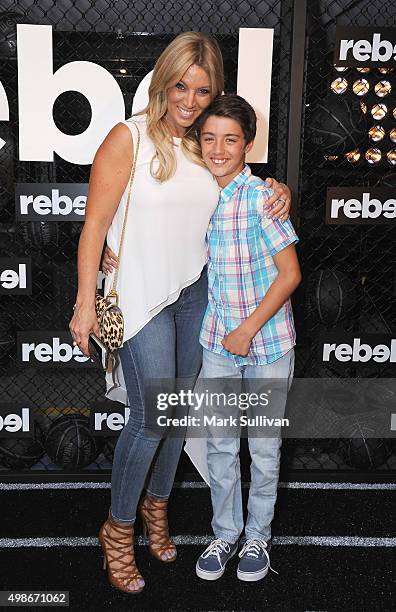 Jo Casanto and her son Max arrive ahead of the opening of Rebels new flagship 'accelerate' store at Westfield Bondi Junction on November 25, 2015 in...