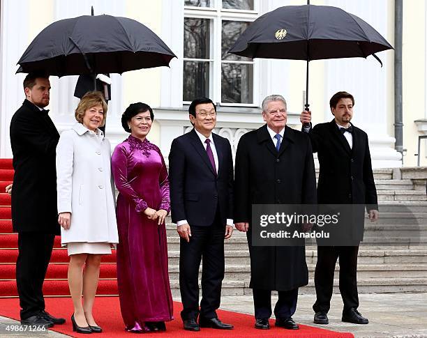 German President Joachim Gauck and Daniela Schadt welcome Vietnam's President Truong Tan Sang and his wife Mai Thi Hanh for an official visit at the...