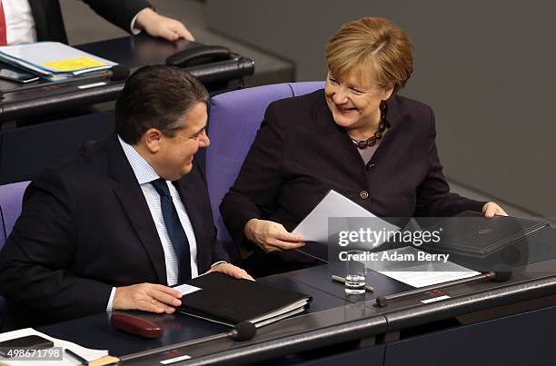 German Chancellor Angela Merkel and Vice Chancellor and Economy and Energy Minister Sigmar Gabriel arrive for a meeting of the Bundestag, the German...