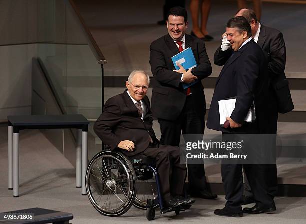 German Finance Minister Wolfgang Schaeuble and Vice Chancellor and Economy and Energy Minister Sigmar Gabriel arrive for a meeting of the Bundestag,...