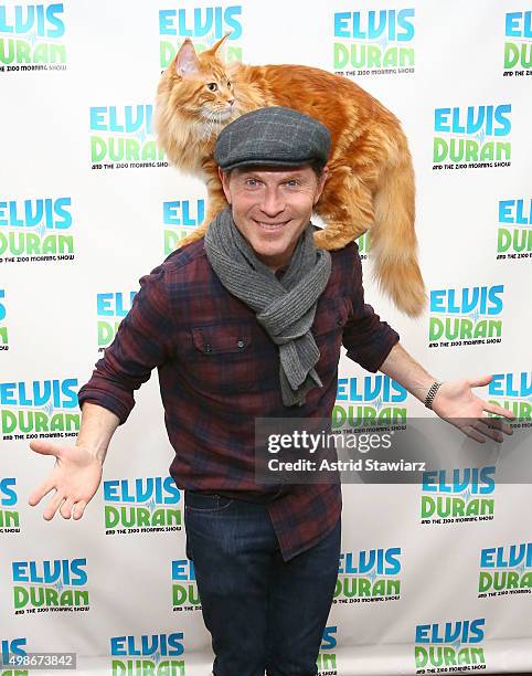 Celebrity chef Bobby Flay and his cat Nacho Flay visit "The Elvis Duran Z100 Morning Show" at Z100 Studio on November 23, 2015 in New York City.