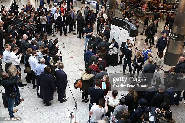 Didier Drogba signs copies of his book "Commitment" at Waterstones Canary Wharf on November 25, 2015 in London, England.