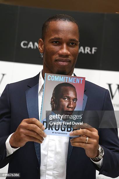 Didier Drogba signs copies of his book "Commitment" at Waterstones Canary Wharf on November 25, 2015 in London, England.