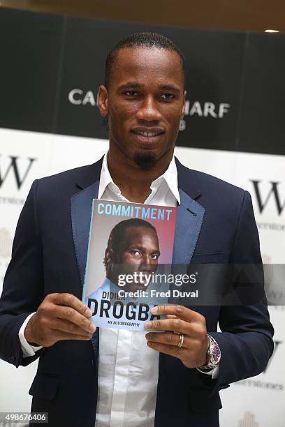 Didier Drogba signs copies of his book "Commitment" at Waterstones Canary Wharf on November 25, 2015 in London, England.