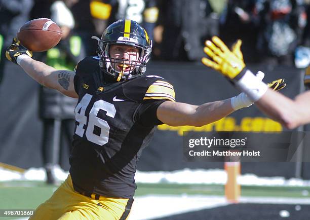 Tight end George Kittle celebrates with wide receiver Matt VandeBerg of the Iowa Hawkeyes after a touchdown in the second half against the Purdue...