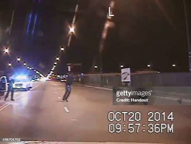 In this still image taken from a police vehicle dash camera released by the Chicago Police Department on November 24 Chicago Police officer Jason Van...